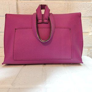 Vibrant Magenta Clutch with Unique Circular Handle